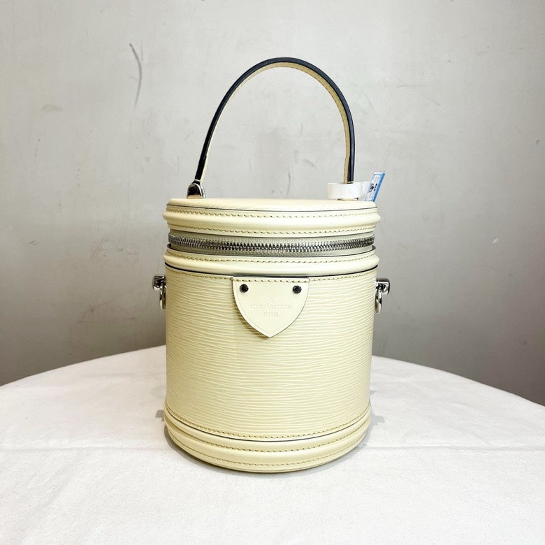 Louis Vuitton LV Epi Bucket Bag with Strap Lock and Key in Ivory Leather