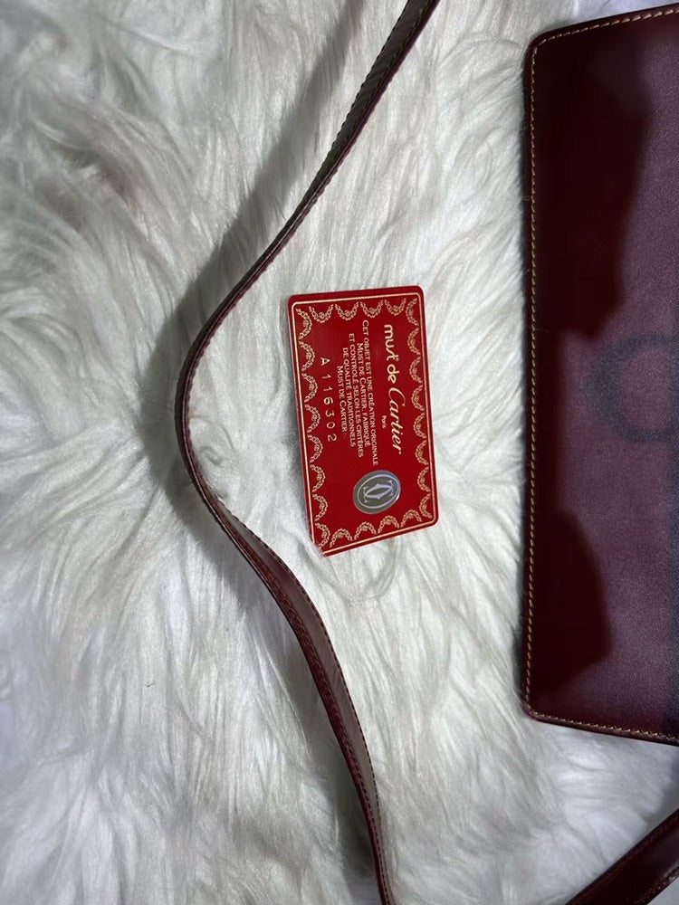 Pre-loved Cartier Leather Burgundy Crossbody Bag