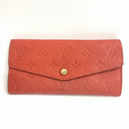 LOUIS VUITTON Monogram Empreinte Leather Rosalie Wallet in Coral - Wallets