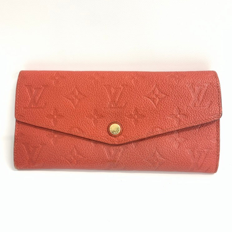 LOUIS VUITTON Monogram Empreinte Leather Rosalie Wallet in Coral - Wallets