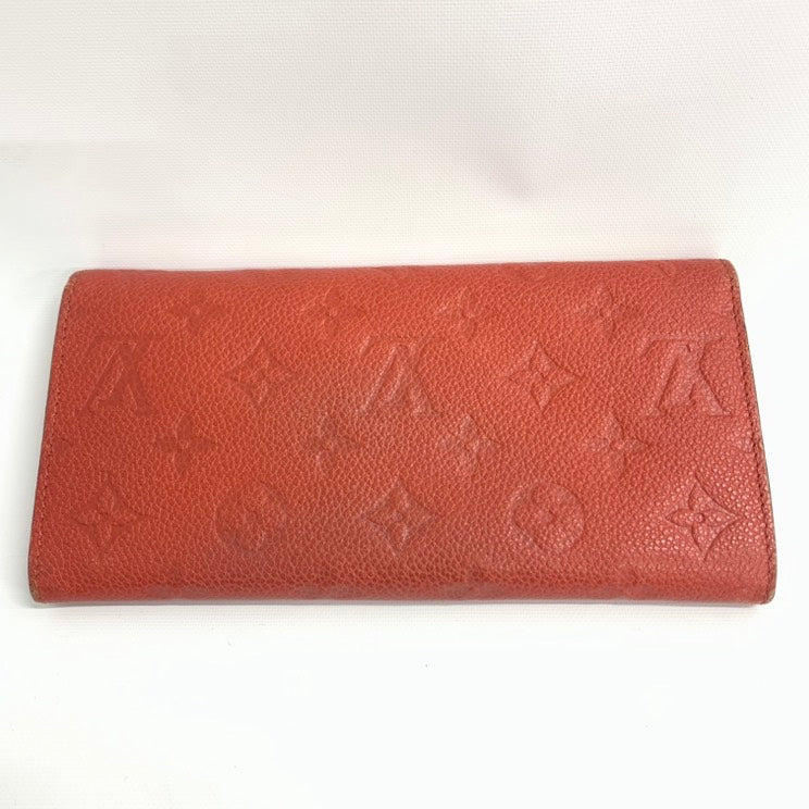 LOUIS VUITTON Monogram Empreinte Leather Rosalie Wallet in Coral - Wallets