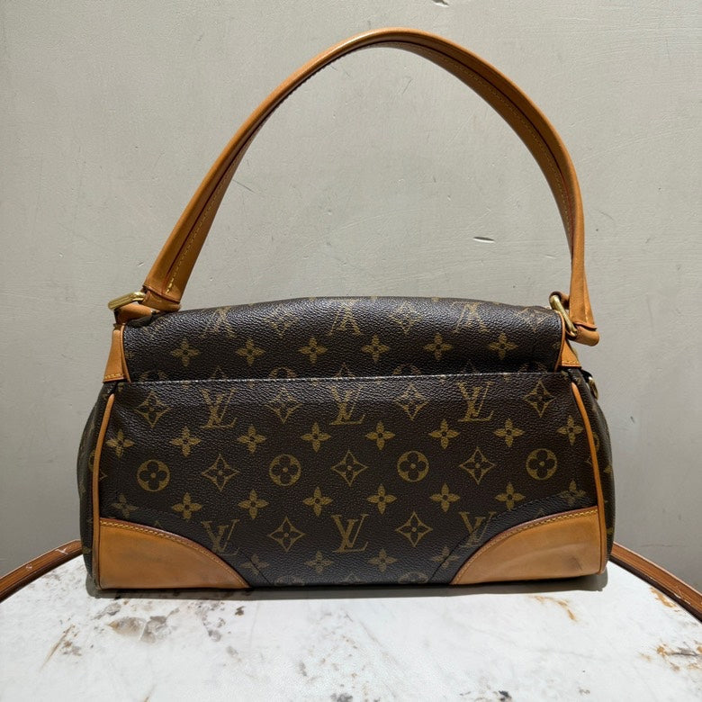 Louis Vuitton Monogram Canvas Sarria Shoulder Bag in Brown Leather