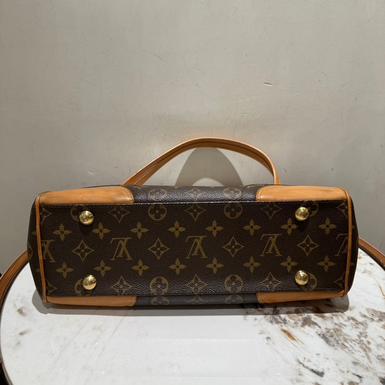 Louis Vuitton Monogram Canvas Sarria Shoulder Bag in Brown Leather