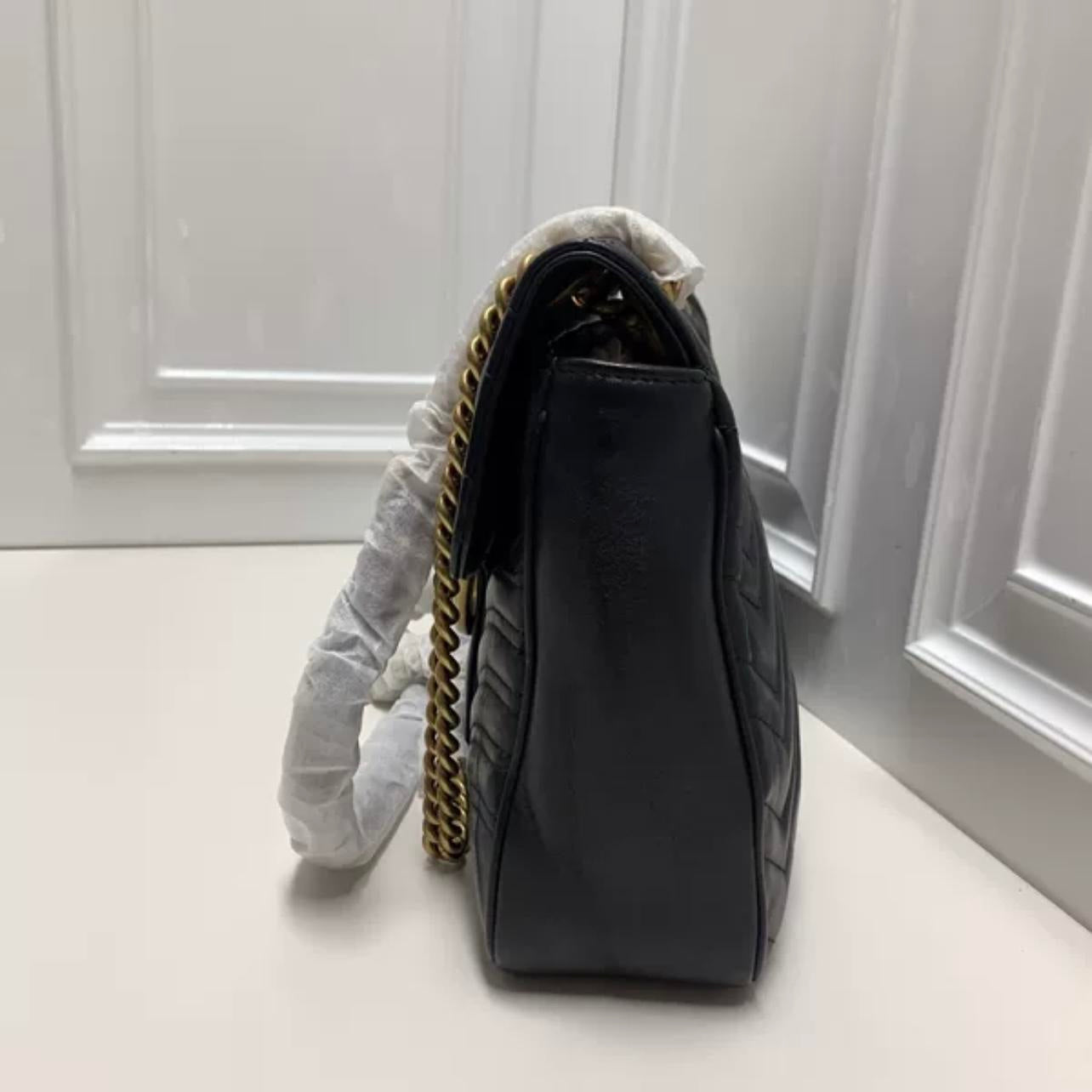Pre-loved Gucci Marmont Black GG Cowskin Shoulder Bag - BJ1101704065